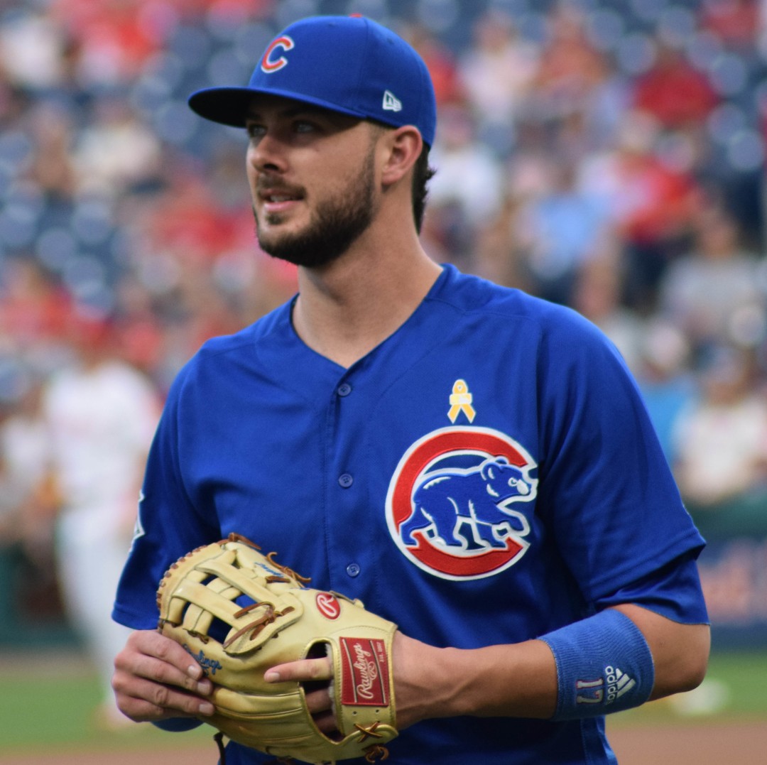 The Cubs Kris Bryant looking up into the stands Wrigley Field