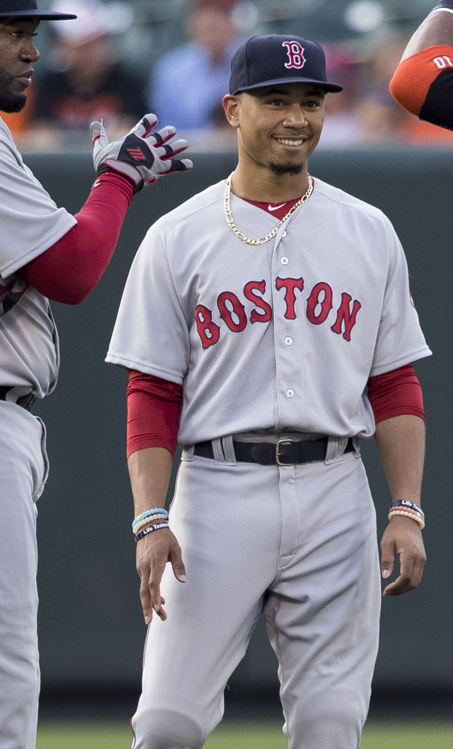 The Red Sox Mookie Betts chatting with teammates before a game